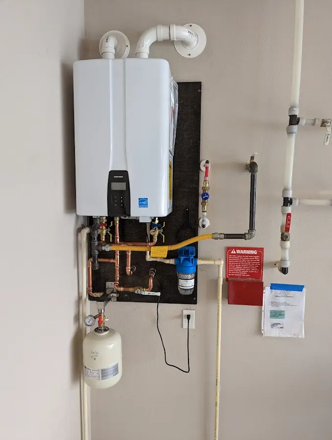 Professional plumber installing copper piping in a Cutler Bay home